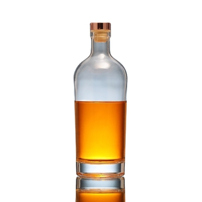 Botella de vidrio de 750 ml de vodka con tapón y material transparente