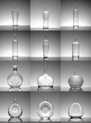 Botella de vidrio transparente de lujo para whisky Logotipo personalizado Forma redonda Botellas de licor de vidrio de 750 ml