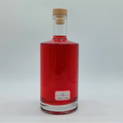 Botella de vidrio transparente de lujo para whisky Logotipo personalizado Forma redonda Botellas de licor de vidrio de 750 ml