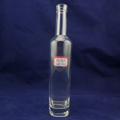 Botella de vidrio transparente de 750 ml hecha de material de vidrio de súper sílex para whisky