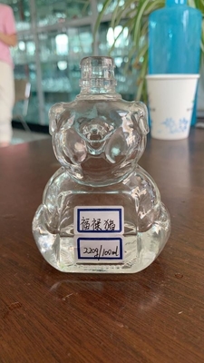 Botella de whisky transparente de cristal de sílex en forma de muñeco de nieve con manejo de superficie decal
