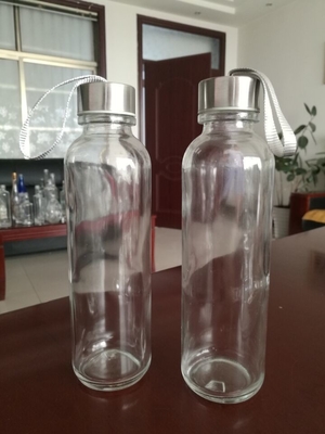 Botella de agua de vidrio vacío industrial Muestra gratuita para prueba