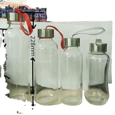 Términos de FOB Botella de agua de vidrio de cristal de súper sílex con tapones y superficie decal 750ml 1000ml