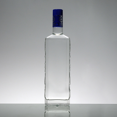 Superficie de estampación en caliente 1L botella de whisky de súper vidrio hecha de material blanco cristalino