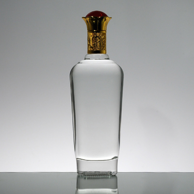 Superficie de estampación en caliente 1L botella de whisky de súper vidrio hecha de material blanco cristalino