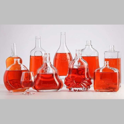 Botella de vidrio de vino de forma única y transparente con tapa de 750 ml certificada por SGS