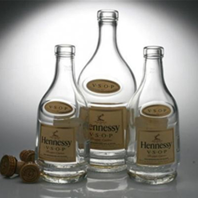 Botella de vidrio de vino de forma única y transparente con tapa de 750 ml certificada por SGS
