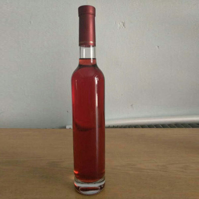 Impresión de logotipo personalizable de vidrio redondo delgado y alto Botellas de vodka con sello de corcho