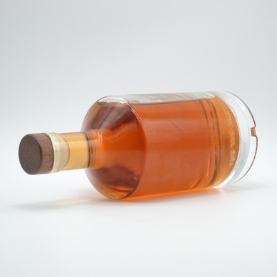 Botella de vidrio redonda de 750 ml de whisky vacío extra de vodka de sílex para bebidas