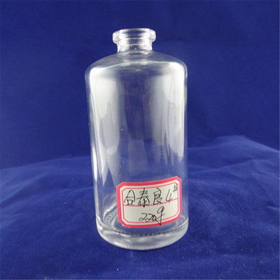 Muestra gratuita 500 ml 750 ml Botella de vidrio redonda de licor con sellado de corcho