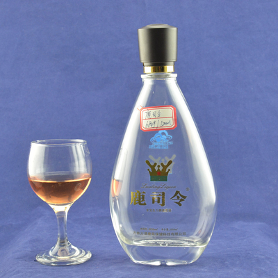 500 ml 750 ml Botellas de vidrio de vodka y whisky Super material de vidrio de sílex y diseño de base plana