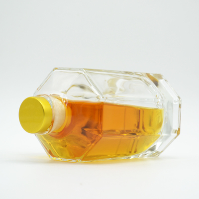 Botella de vidrio de forma única de 700 ml para el material de vidrio XO/Brandy Super Flint y tapa de corona