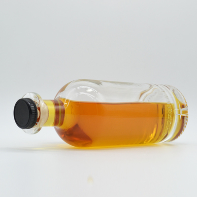 Botella de vidrio de forma única de 700 ml para el material de vidrio XO/Brandy Super Flint y tapa de corona