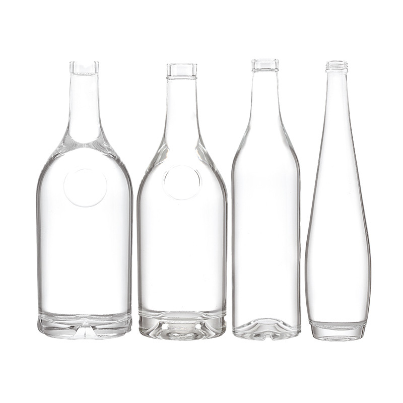 Bebidas industriales 500 ml Botella de vidrio redondo y transparente de licor con tapa de corcho hermética