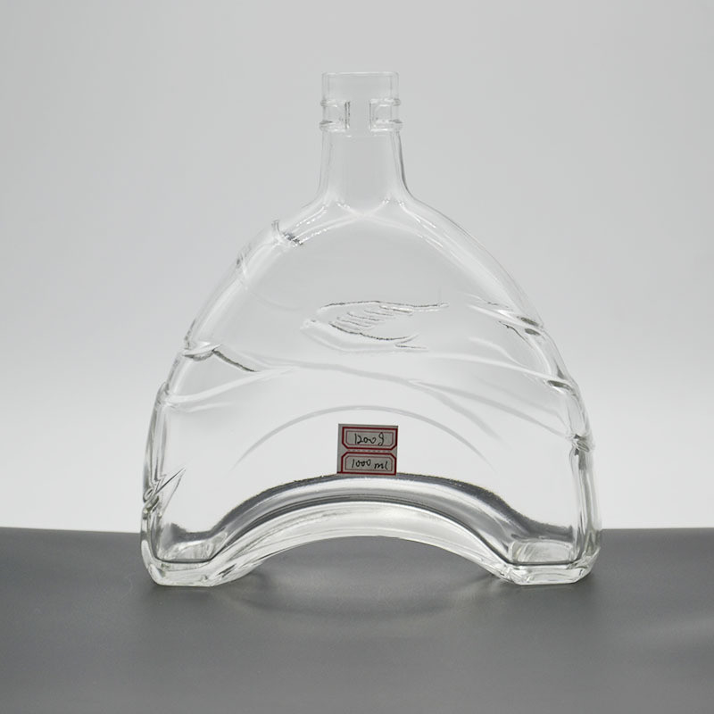 Botellas de alcohol personalizadas de 750 ml de material de vidrio de súper sílex botella de vidrio de brandy con corcho
