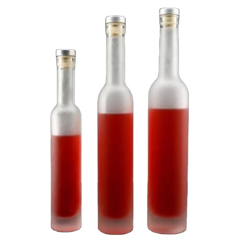 Botella de vodka de vidrio transparente de 1L con manipulación de superficie de helado y otro proceso profundo