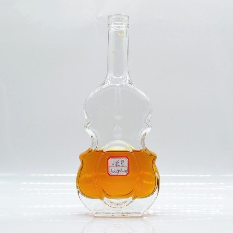 Envase de vidrio transparente de 700 ml 750 g para botella de cráneo de violín de forma especial