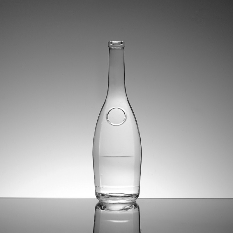 Botella de vidrio redonda con tapa de corcho para 550 ml 700 ml 750 ml de vodka gin ron en forma de cilindro