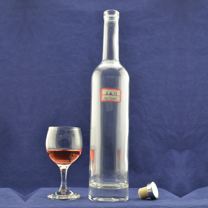 Botella de vidrio de licor delgado para whisky/brandy/vodka sellada con tapa giratoria
